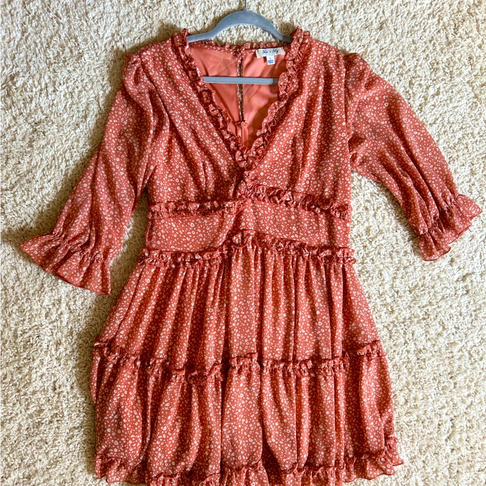 Burnt orange, long sleeved ruffle mini dress